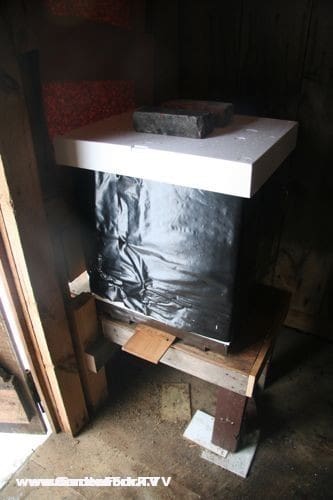 The hive in our shed, wrapped with a insulating blanket and a polystyrene outer cover