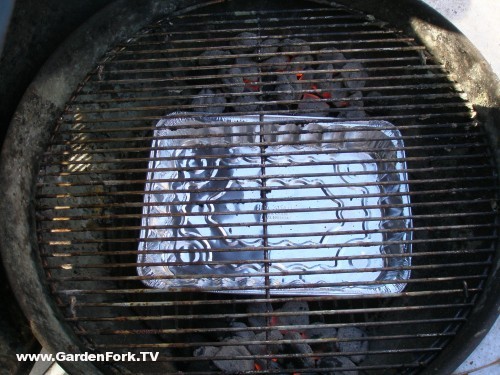 add a drip pan between the coals