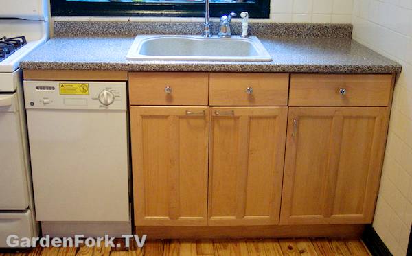 kitchen counter with dishwasher