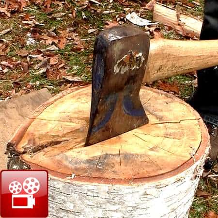 split wood with an axe