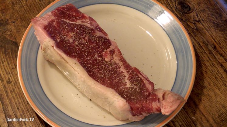 A slice of cake on a plate, with Steak