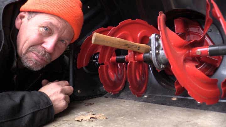 Eric Rochow next to snowblower